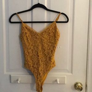 Gold lace bodysuit